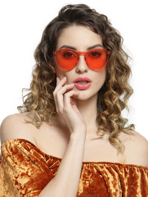 Gafas de sol transparentes de color caramelo de una pieza sin montura